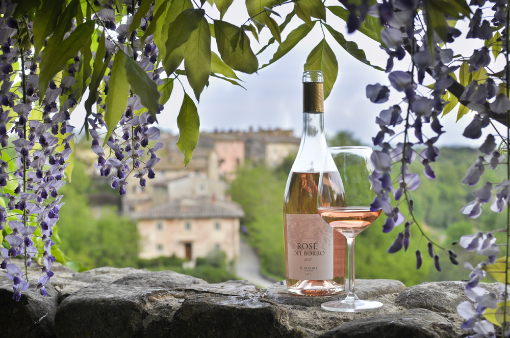 Il Borro's rosé and a view of the historic hamlet of Il Borro